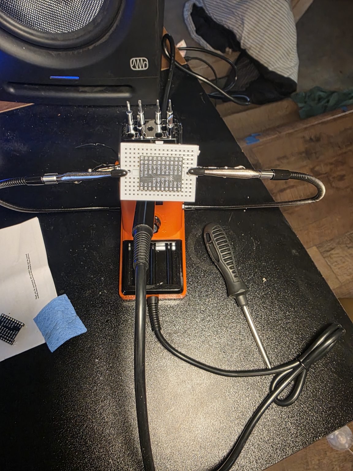Soldering pins onto an MCP expander board.