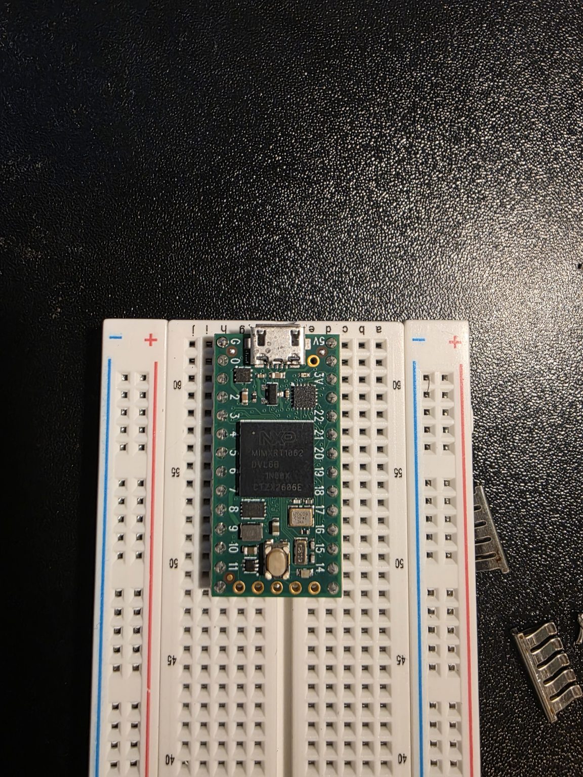 A Teensy board on a breadboard with the other components removed.