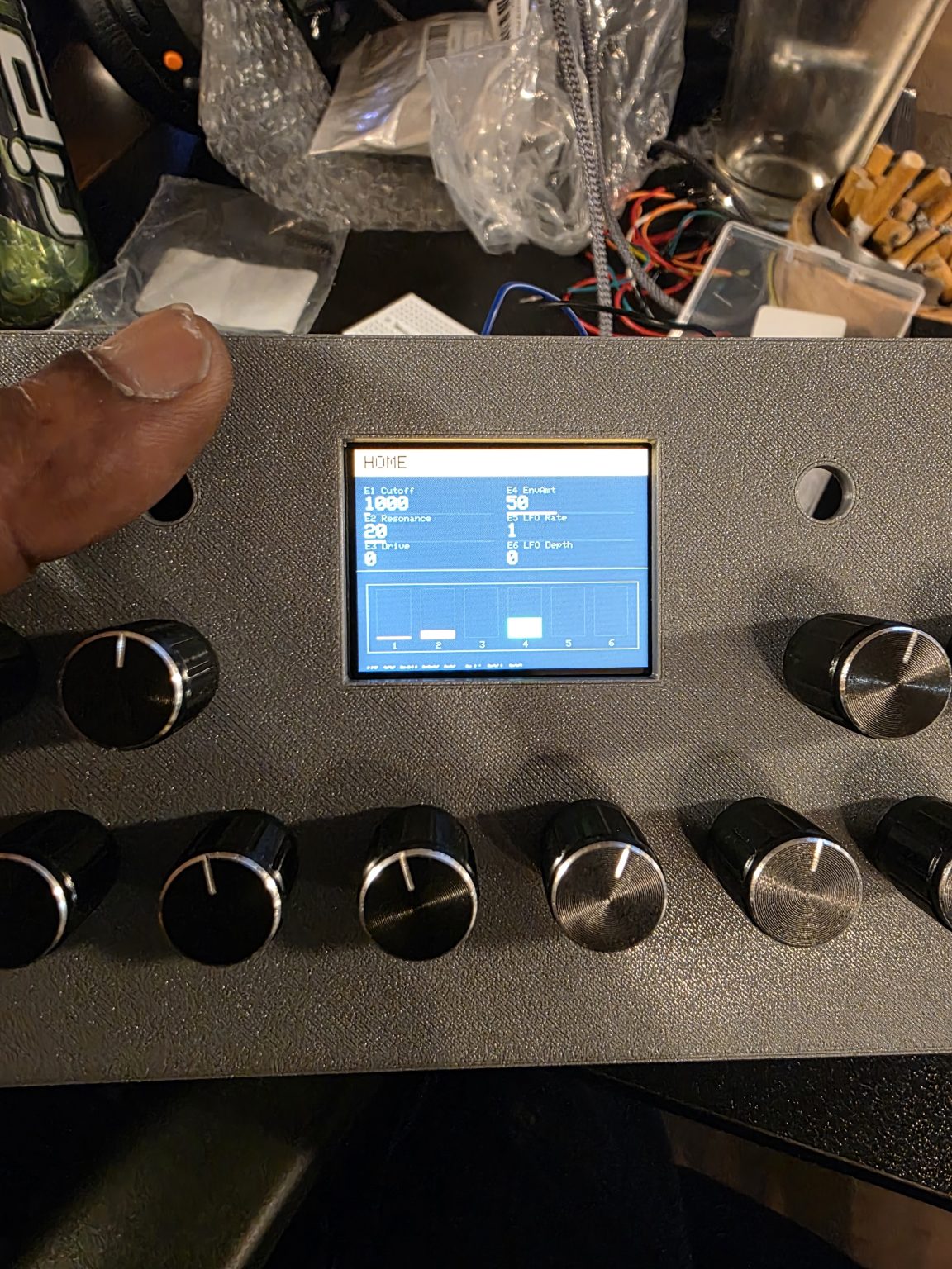 The rev2 interface on the display, fitted into a grey faceplate.